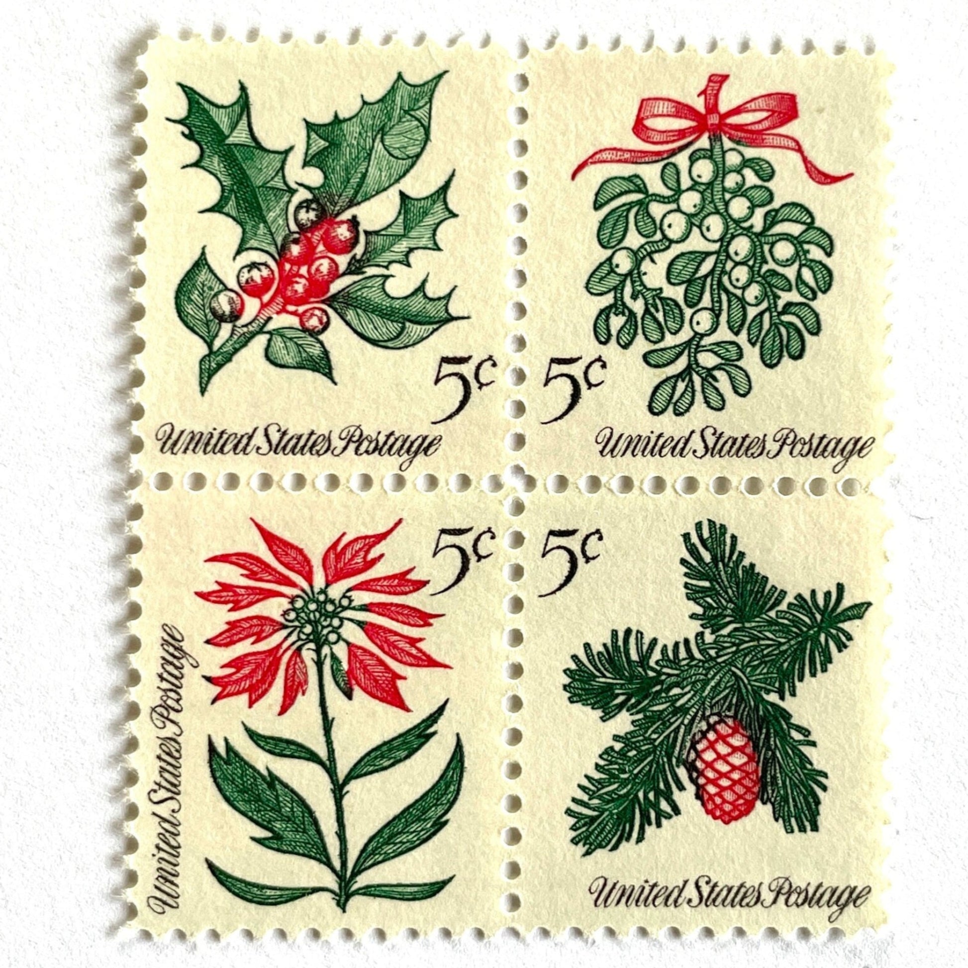Image of four 5-cent “Christmas Issue Se-Tenant” USPS postage stamps featuring green and red holiday plants from the 1964 Contemporary Christmas Series. Mistletoe, Holly, Poinsettia, Evergreen. Scott #1254, Scott #1255, Scott #1256, Scott #1257.