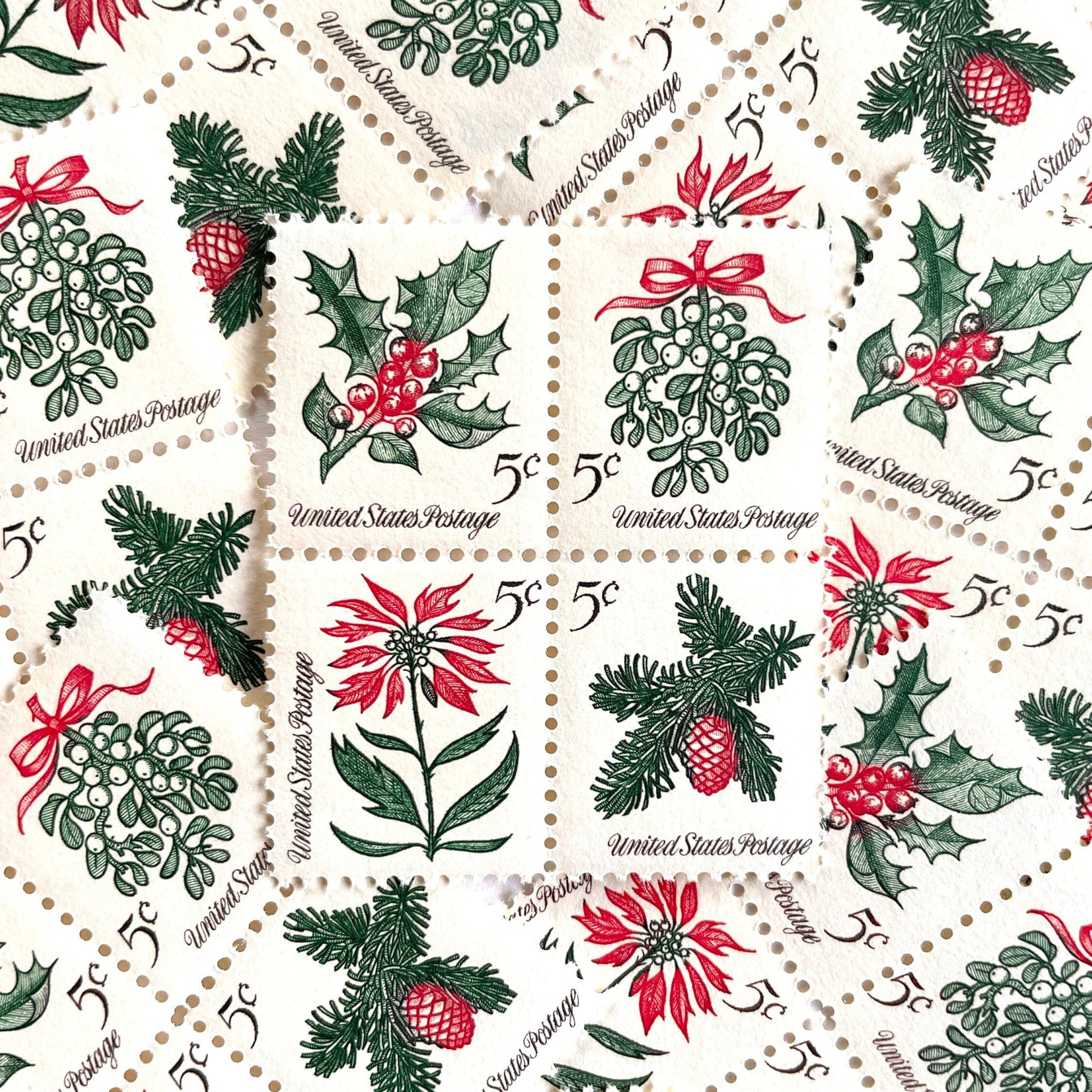 Image of four 5-cent “Christmas Issue Se-Tenant” USPS postage stamps featuring green and red holiday plants from the 1964 Contemporary Christmas Series. Mistletoe, Holly, Poinsettia, Evergreen. Scott #1254, Scott #1255, Scott #1256, Scott #1257.