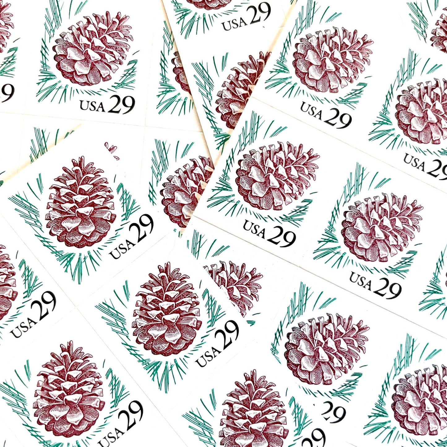 Image of 1993 Flora and Fauna “Pine Cone” 29-cent stamps. Scott #2491. Stamp Themes: Pinecone, Evergreen, Ponderosa Pine, Christmas, Holidays. Red and green postage stamp.
