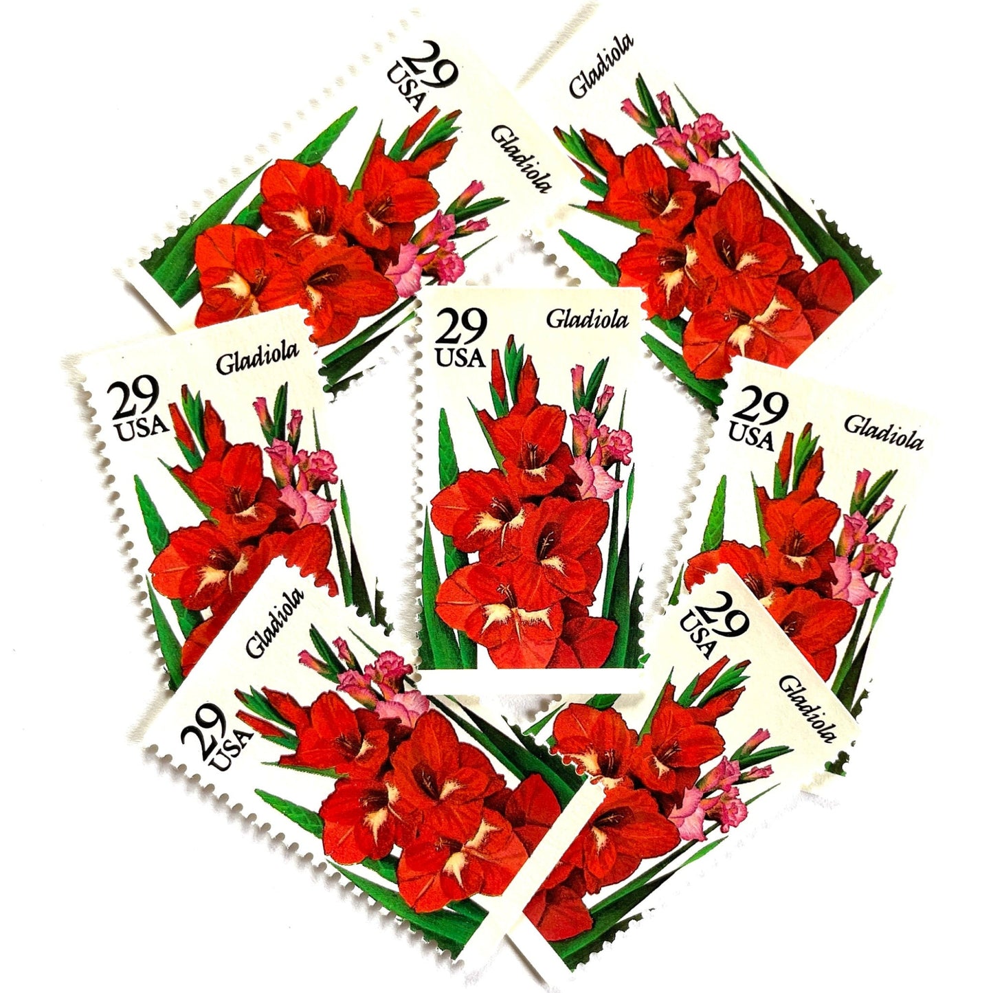 Image of Gladiola postage stamps from the 1994 Summer Garden Flowers series, featuring red-orange gladiola blossoms with green foliage on vintage unused 29-cent USPS postage, Scott 2831.