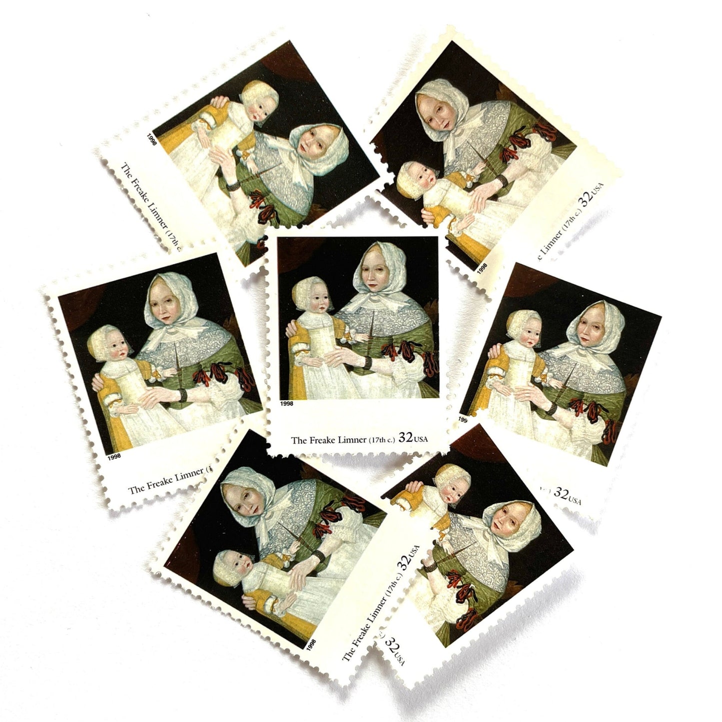 The Freake Limner’s "Mrs. Elizabeth Freake and Baby Mary" Postage Stamp from the 1998 Four Centuries of American Art Series. This stamp depicts a Colonial era painting of a woman with her baby daughter. An iconic motherhood theme, this predominately black and white postage stamp is often used to mail wedding invitations or birth announcements. These are vintage unused USPS postage stamps with a face value of 32 cents each. Scott number 3236B.