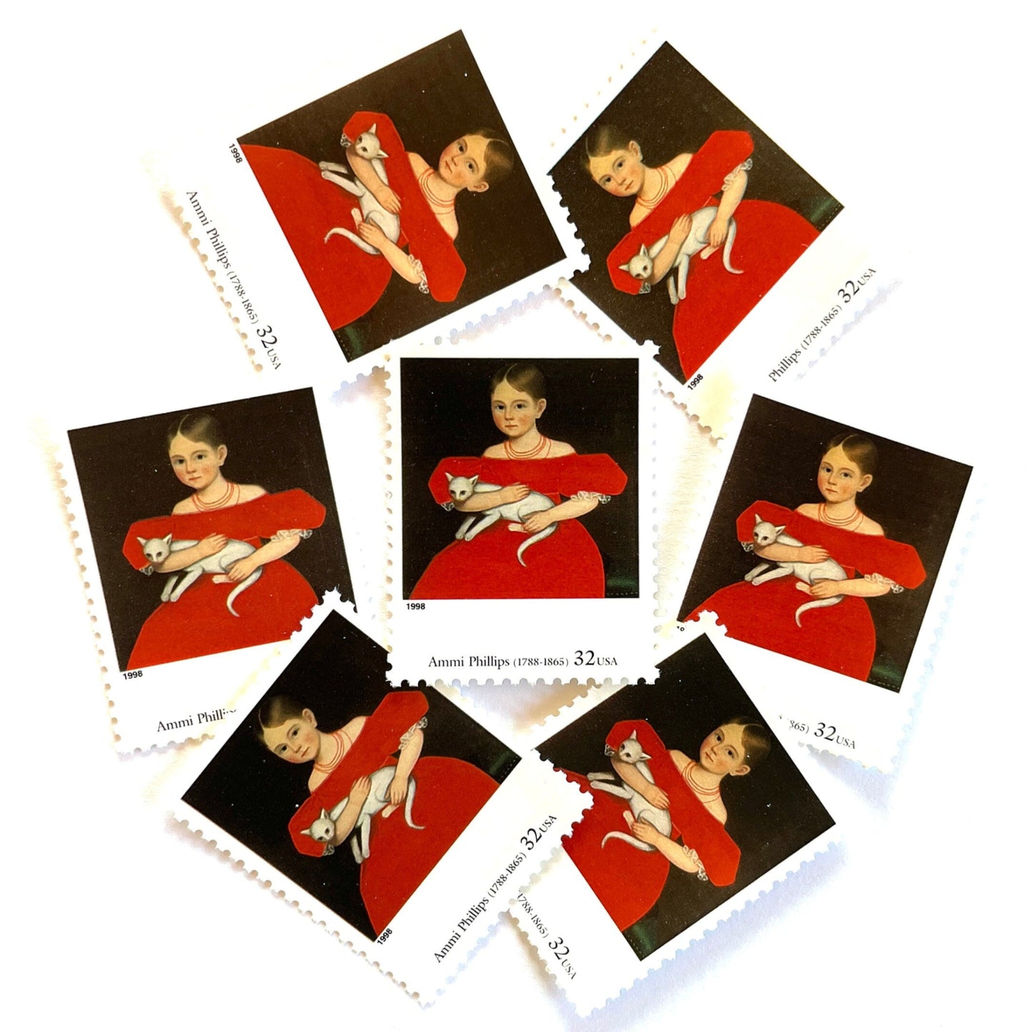 Ammi Phillips's "Girl in Red Dress with Cat and Dog" Postage Stamps from the 1998 Four Centuries of American Art Series. This postage stamp depicts a portrait painting of a young girl seated, wearing a red dress, sitting with a white cat in her arms. This vintage unused USPS Postage stamp is often used to mail wedding invitations, save the date invitations, and has a face value of 32 cents. Scott number 3236C.