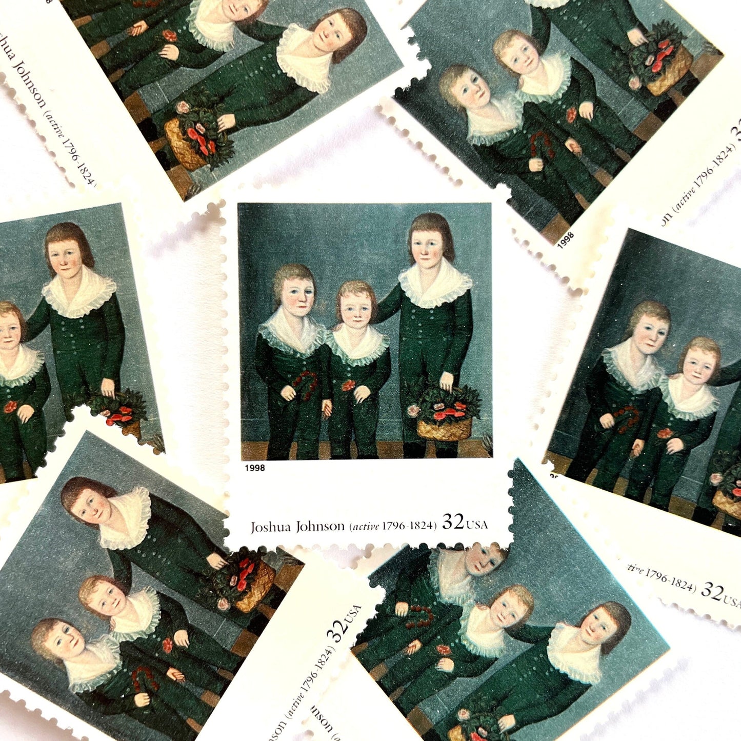 Joshua Johnson’s “The Westwood Children" Postage Stamp from the 1998 Four Centuries of American Art Series. This stamp depicts a trio of children, the Westwood siblings, painted in the folk style. An iconic childhood theme, this predominately blue postage stamp painted by one of the first recognized African American painters, is often used to mail wedding invitations. These are vintage unused USPS postage stamps with a face value of 32 cents each. Scott number 3236H.
