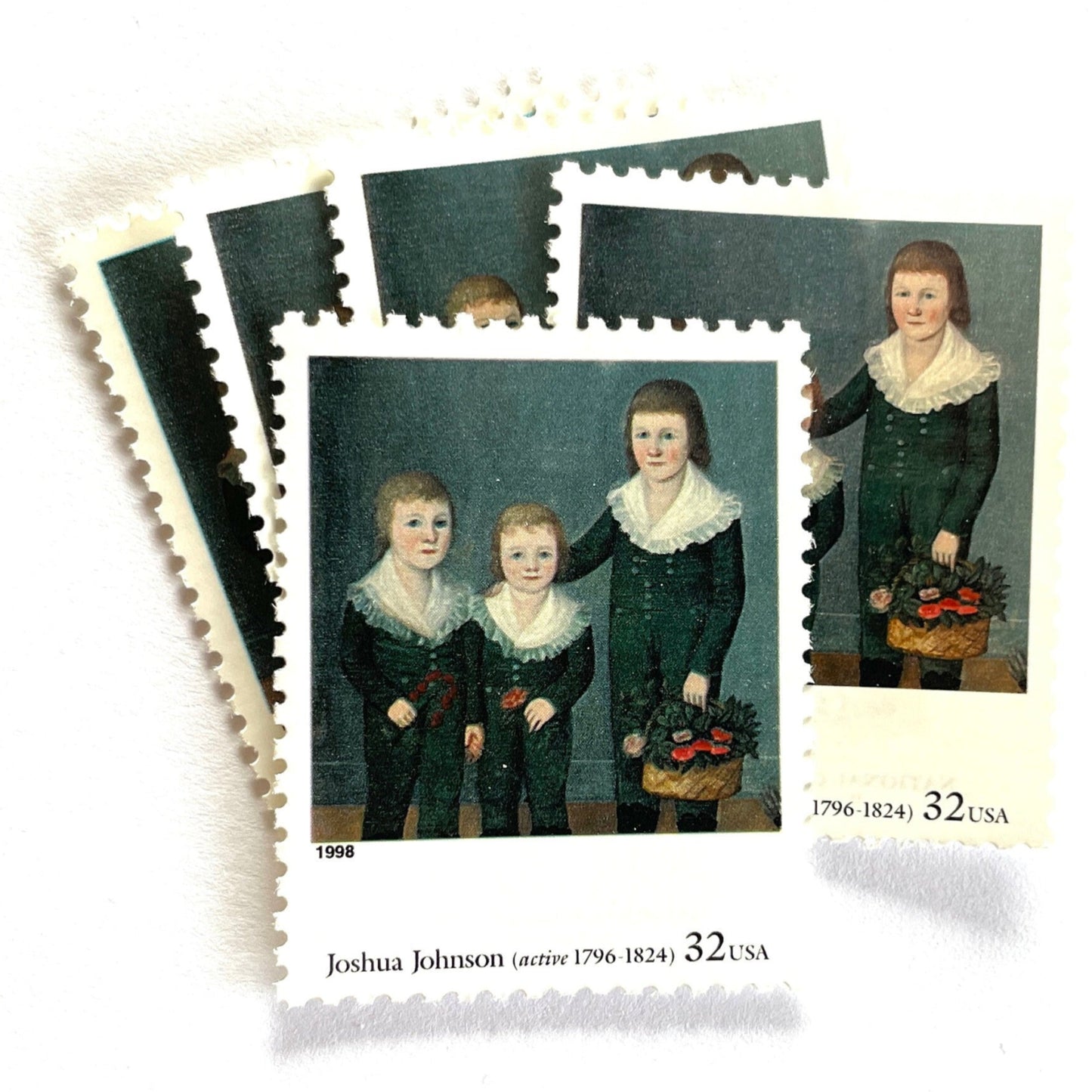 Joshua Johnson’s “The Westwood Children" Postage Stamp from the 1998 Four Centuries of American Art Series. This stamp depicts a trio of children, the Westwood siblings, painted in the folk style. An iconic childhood theme, this predominately blue postage stamp painted by one of the first recognized African American painters, is often used to mail wedding invitations. These are vintage unused USPS postage stamps with a face value of 32 cents each. Scott number 3236H.