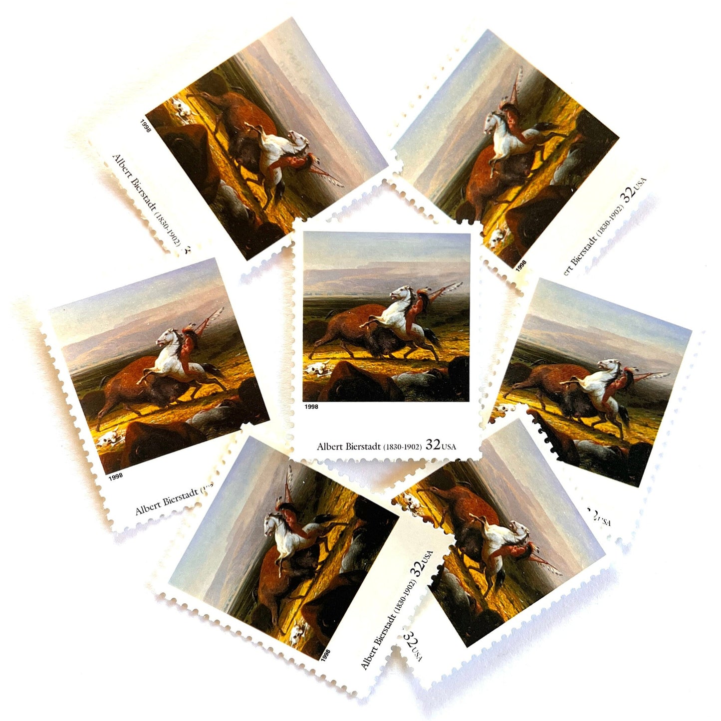 Albert Bierstadt's "The Last of the Buffalo" Postage Stamp from the 1998 Four Centuries of American Art Series. The stamp depicts a Native American Indian riding a white horse, hunting a bison or buffalo on the plains. An iconic western theme, this postage stamp depicts the American West. These are vintage unused USPS postage stamps with a face value of 32 cents. Scott number 3236M.