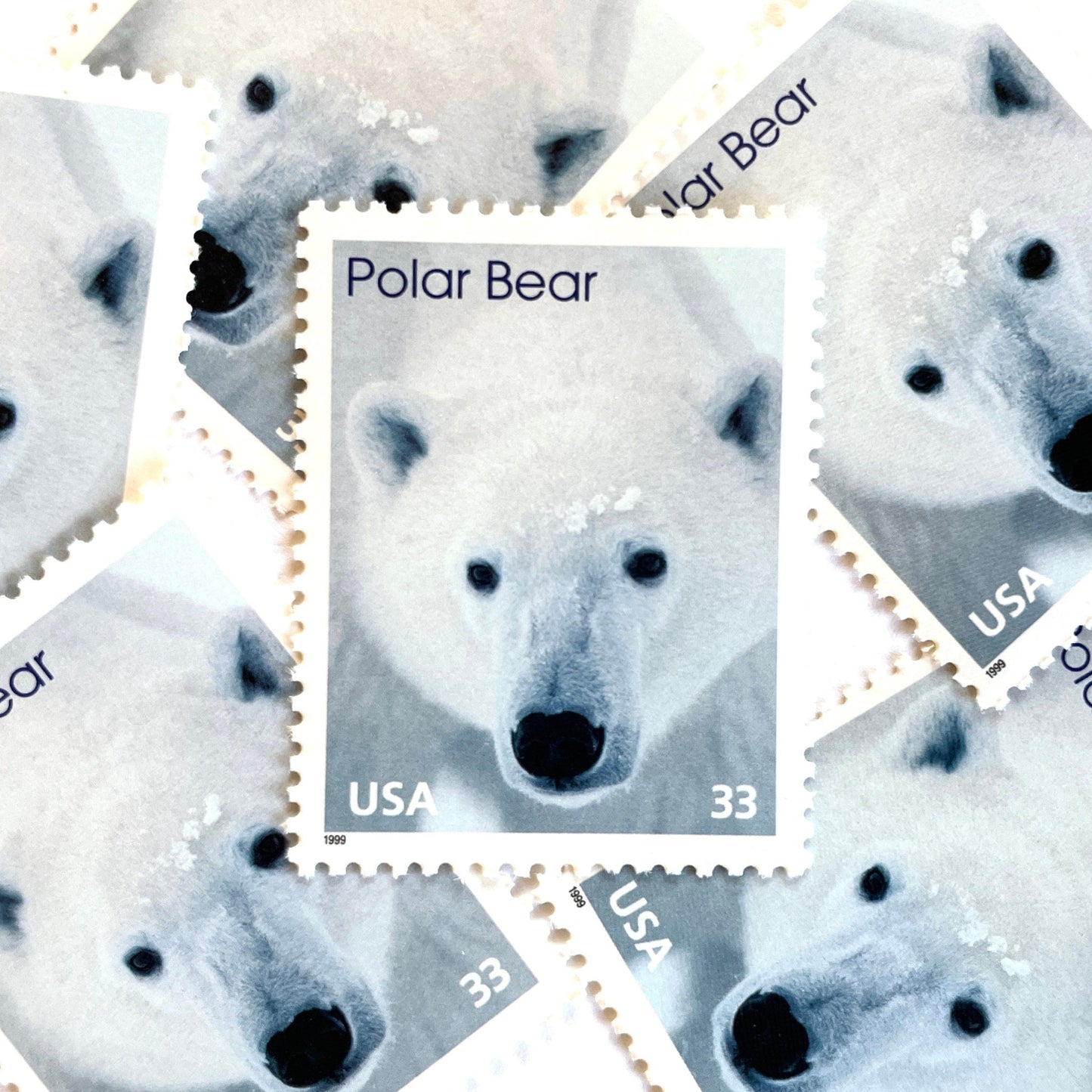 Image of 1999 Arctic Animals “Polar Bear” 33-cent stamps. Scott #3291. Stamp Themes: Winter, Snow, Christmas, Holidays, Wildlife, Alaska. White postage stamp.