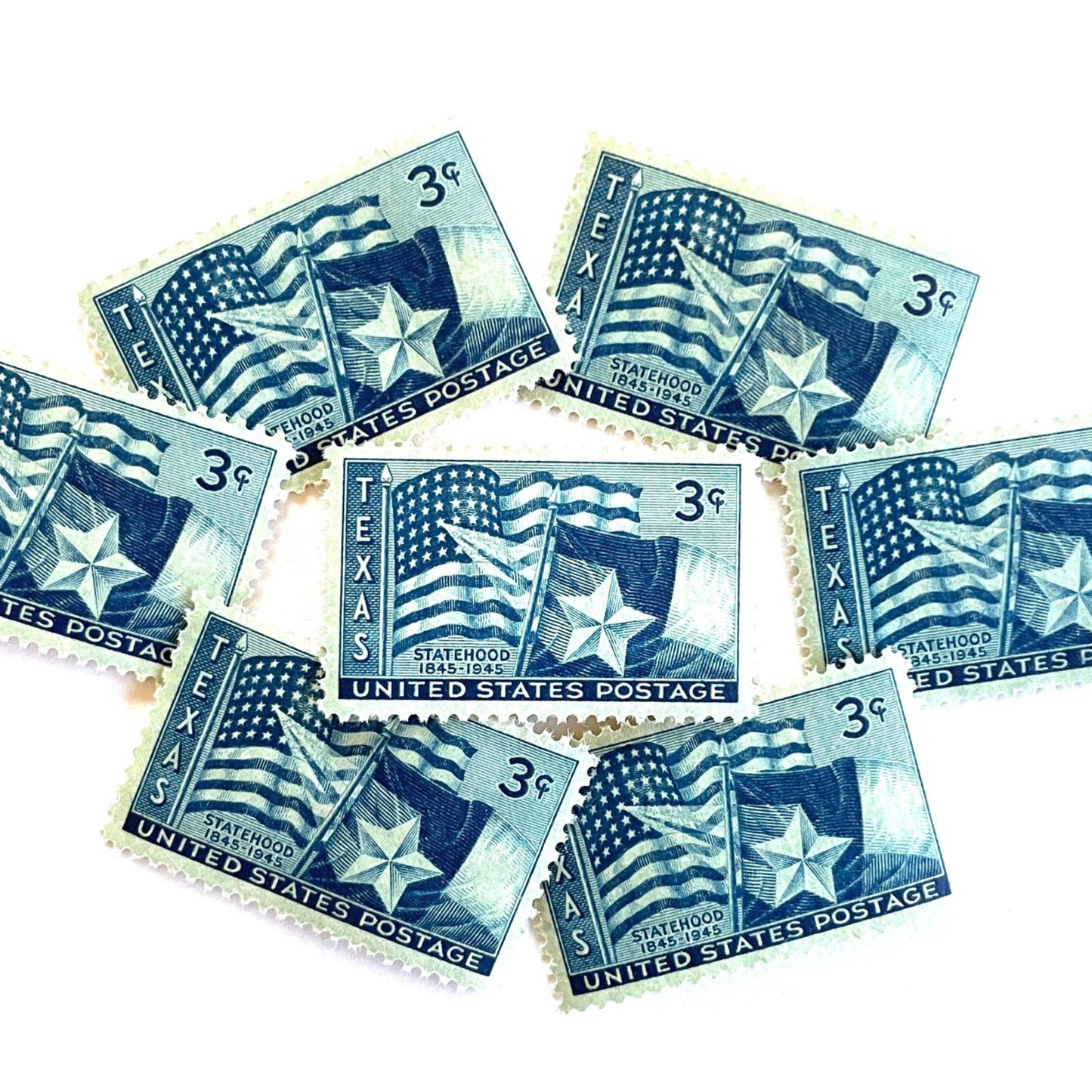 Image of 1945 Texas Statehood 3-cent dark blue postage stamps. Scott #938. Stamp themes: Texas, Lone Star State, Texas flag, U.S. flag, patriotic, statehood centennial, American history.