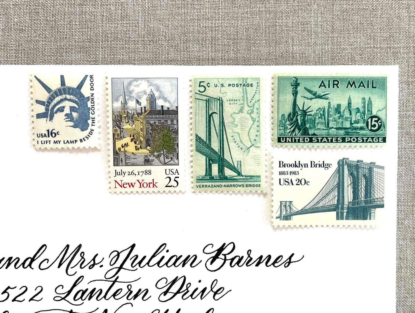 These unused vintage stamp sets are perfect for mailing New York or NYC-themed wedding invitations, save-the-dates, engagement announcements, bridal shower invites, thank you notes, or other special correspondence. Each curated set is comprised of five (5) unused stamps with a total USPS postage value of 81 cents — enough postage to mail a standard letter weighing up to 1 ounce. These unused U.S. stamps are perfectly valid for use as postage.