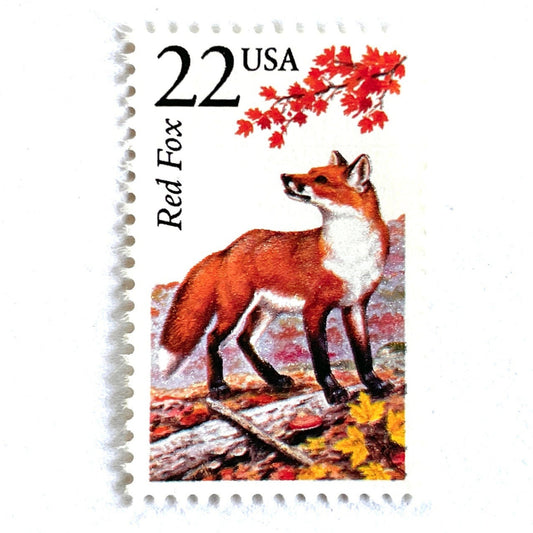 Image of 1987 North American Wildlife Series “Red Fox” 22-cent vintage unused mail stamps. Scott #2335. Stamp Themes: Wildlife, Nature, Autumn, Fall, Marist College, Frankie the Red Fox, Hunting. Red, Orange, Yellow, Multicolored postage stamp.
