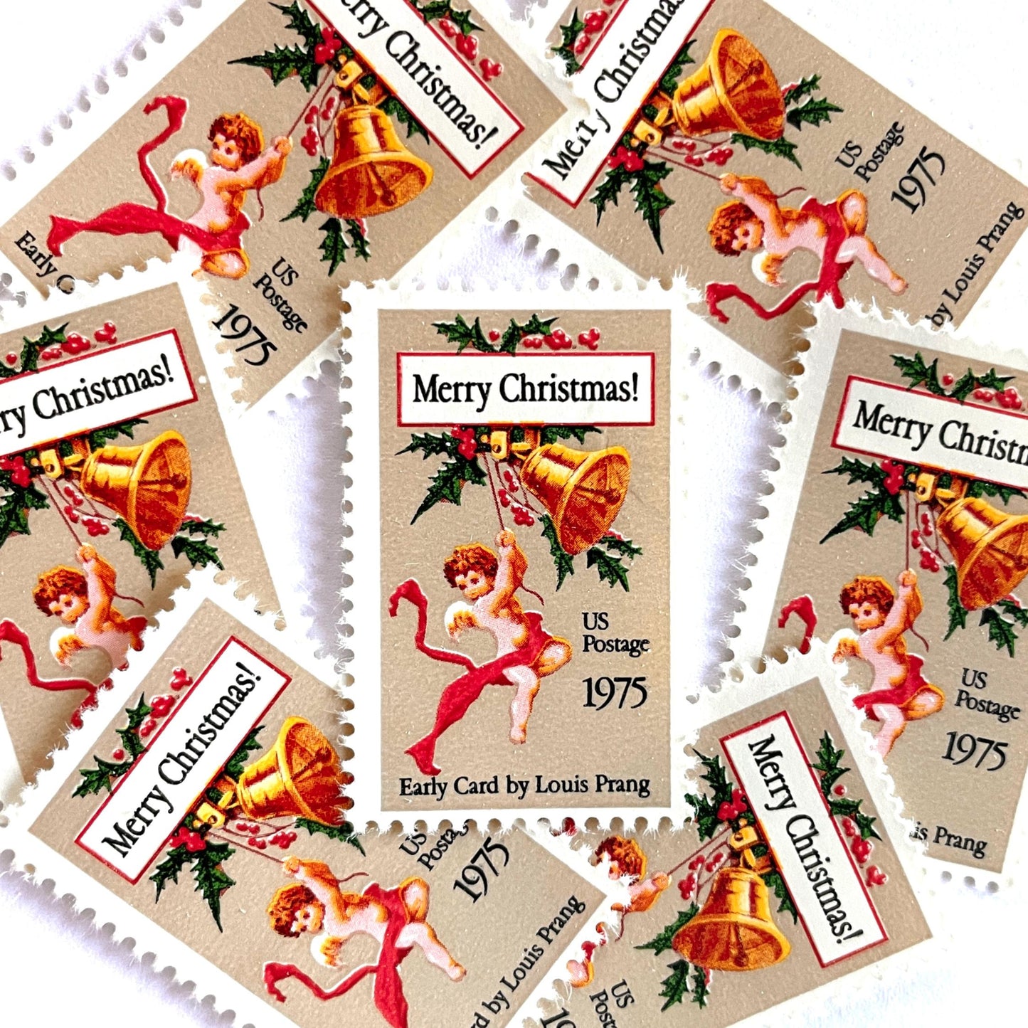 Image of 1975 Contemporary Christmas “Christmas Card” 10-cent stamps. Scott #1580. Stamp Themes: Cherub, Angel, Bells, Christmas Card, Holly, Holidays, Merry Christmas, Early Card by Louis Prang. Red, green, gold postage stamp.
