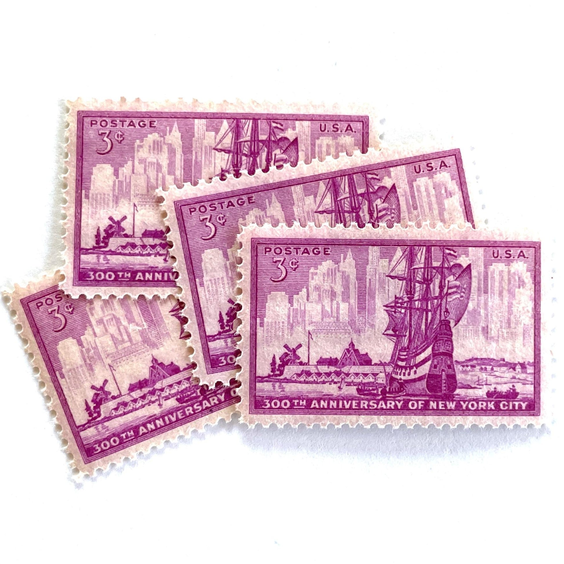 Image of 1953 “New York City” 300th Anniversary 3-cent mail stamps. Scott #1027. Stamp Themes: New York City, NYC, Big Apple, New Amsterdam, Dutch Settlement, New York Skyline, Sailing. Red/violet postage stamp.