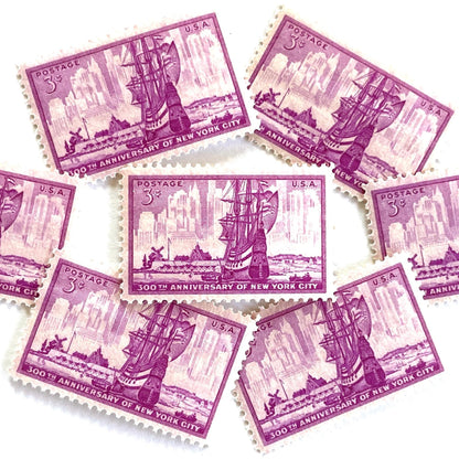 Image of 1953 “New York City” 300th Anniversary 3-cent mail stamps. Scott #1027. Stamp Themes: New York City, NYC, Big Apple, New Amsterdam, Dutch Settlement, New York Skyline, Sailing. Red/violet postage stamp.
