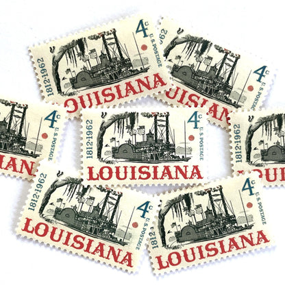 Image of Louisiana Statehood postage stamps from 1962, featuring a Mississippi River steamboat on vintage unused 4-cent USPS postage, Scott 1197.