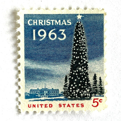 Image of 1963 “Christmas Tree and White House” 5-cent stamps. Scott #1240. Stamp Themes: National Christmas Tree, The White House, Capitol, Washington DC, Winter Christmas Scene, Holidays. Blue, white, red postage stamp.