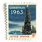 Image of 1963 “Christmas Tree and White House” 5-cent stamps. Scott #1240. Stamp Themes: National Christmas Tree, The White House, Capitol, Washington DC, Winter Christmas Scene, Holidays. Blue, white, red postage stamp.