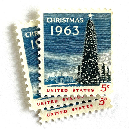 Image of 1963 “Christmas Tree and White House” 5-cent stamps. Scott #1240. Stamp Themes: National Christmas Tree, The White House, Capitol, Washington DC, Winter Christmas Scene, Holidays. Blue, white, red postage stamp.