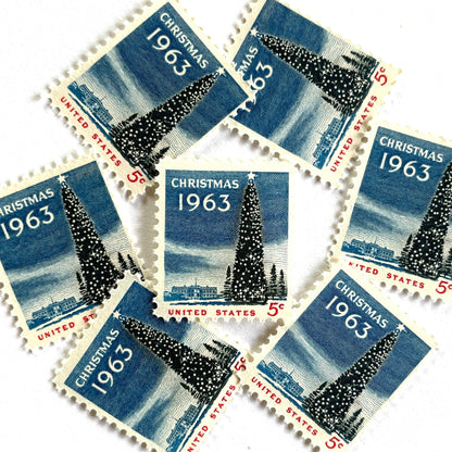 Image of 1963 “Christmas Tree and White House” 5-cent stamps. Scott #1240. Stamp Themes: National Christmas Tree, The White House, Capitol, Washington DC, Winter Christmas Scene, Holidays. Blue, white, red postage stamp.