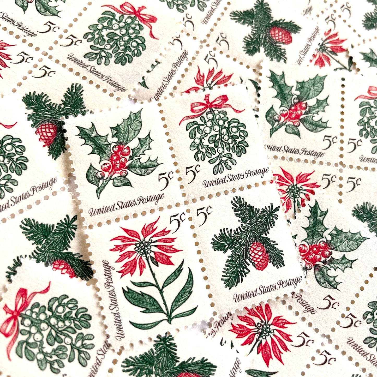 Image of four 5-cent “Christmas Issue Se-Tenant” USPS postage stamps featuring green and red holiday plants from the 1964 Contemporary Christmas Series. Mistletoe, Holly, Poinsettia, Evergreen. Scott #1254, Scott #1255, Scott #1256, Scott #1257.