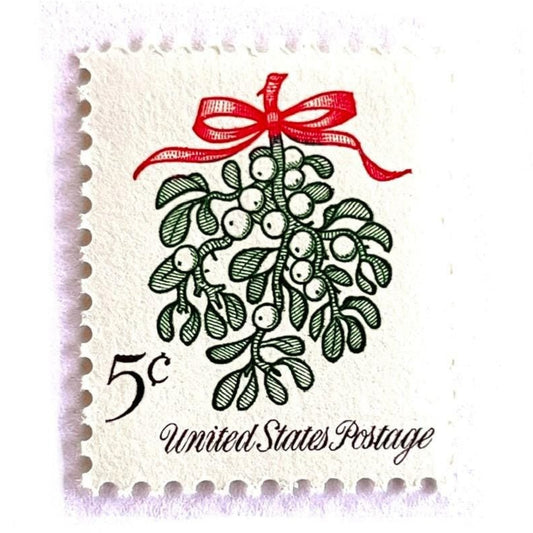Image of 1964 Third Christmas Issue “Mistletoe” 5-cent mail stamps. Scott #1255. Stamp Themes: Christmas, Holidays, Winter Flora, Kissing, Holiday Plant, Holiday Décor. Green and red postage stamp.