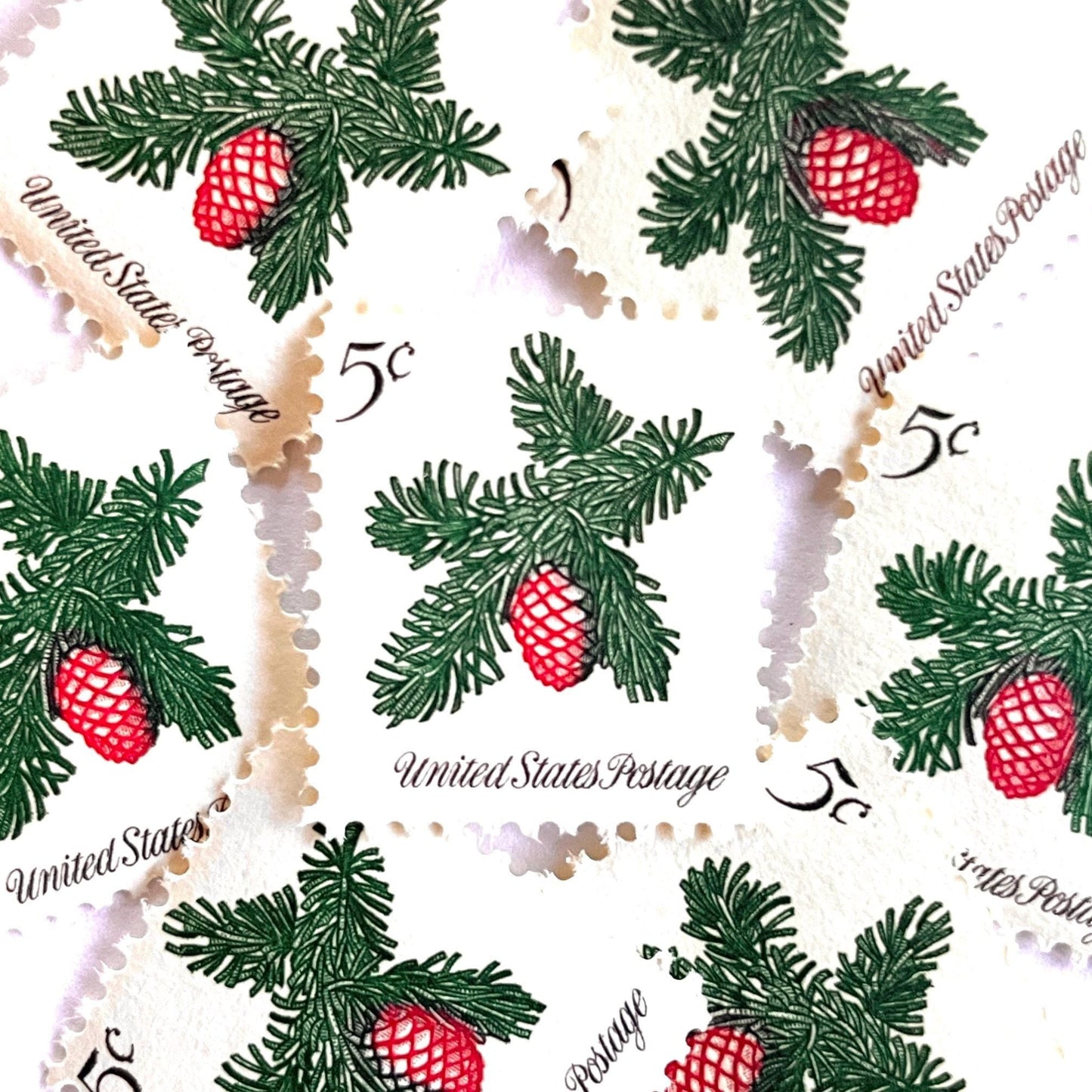 Image of 1964 Third Christmas Issue “Sprig of Conifer” 5-cent mail stamps. Scott #1257. Stamp Themes: Conifer, Pine Cone, Evergreen, Tree, Pine Needles, Holiday Decor. Green and red postage stamp.