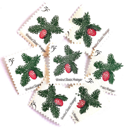 Image of 1964 Third Christmas Issue “Sprig of Conifer” 5-cent mail stamps. Scott #1257. Stamp Themes: Conifer, Pine Cone, Evergreen, Tree, Pine Needles, Holiday Decor. Green and red postage stamp.