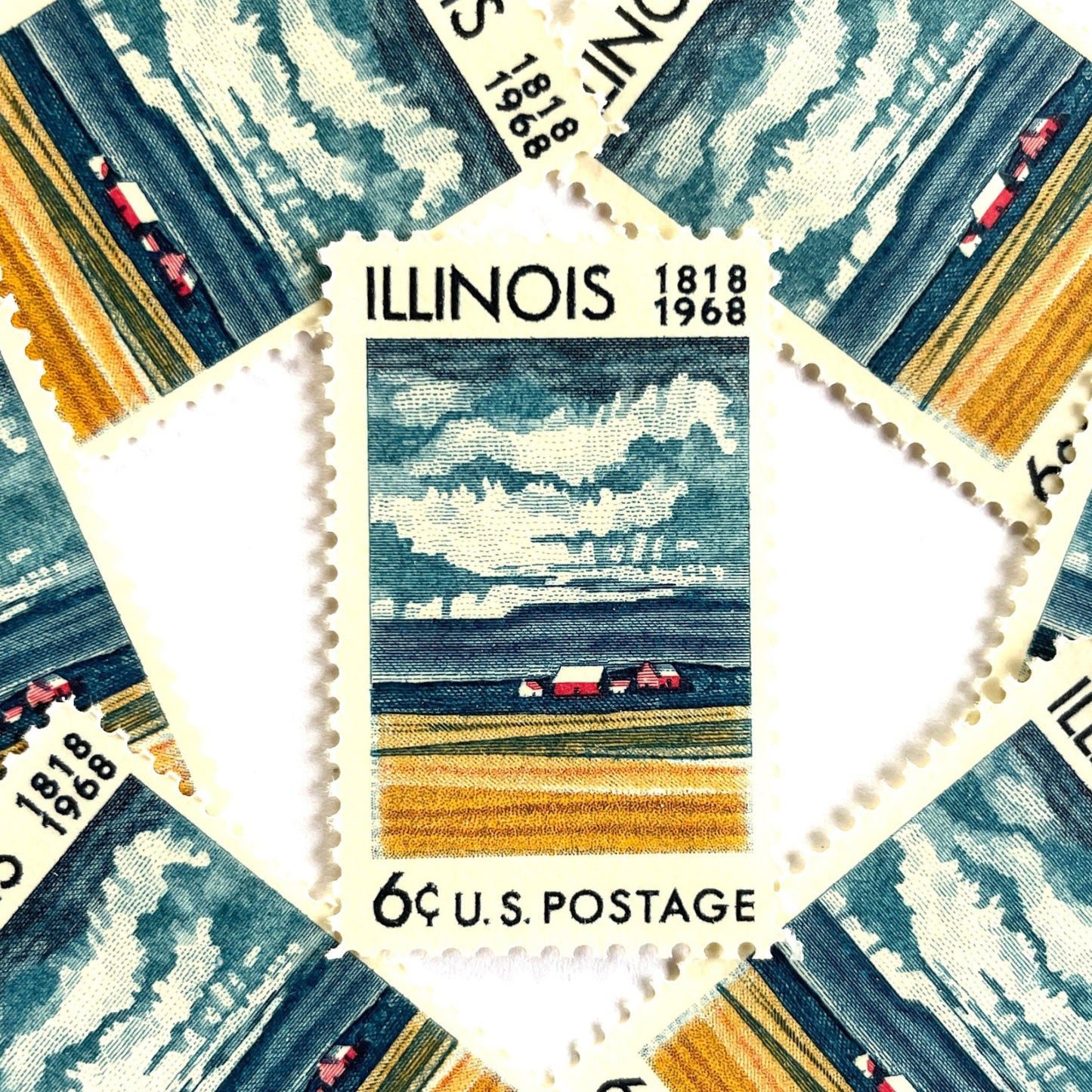 Image of Illinois Statehood postage stamps from 1968, issued for the 150th anniversary of Illinois statehood, featuring a farm on the Prairie with dramatic clouds overhead artwork on vintage unused 6-cent USPS postage, Scott 1339.