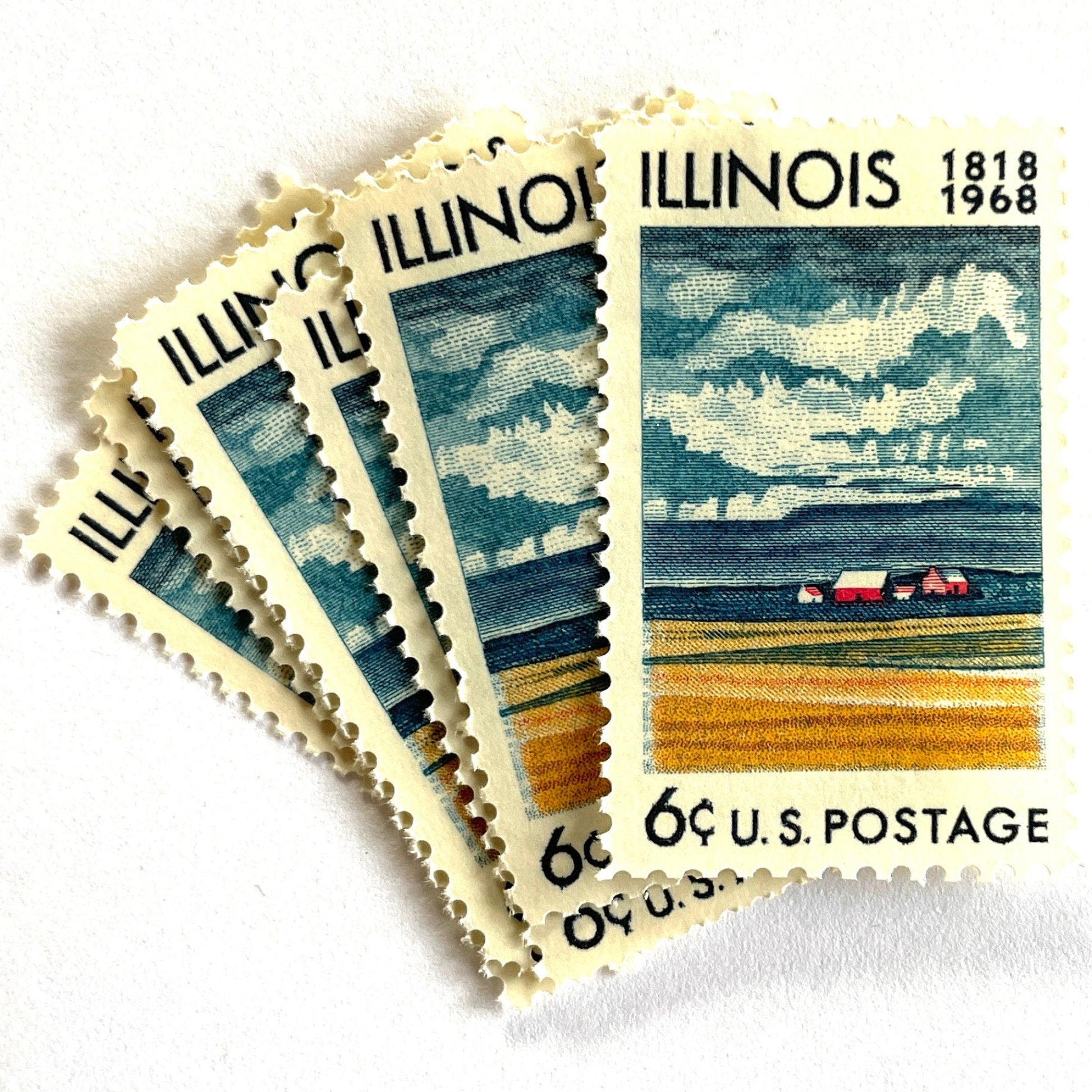 Image of Illinois Statehood postage stamps from 1968, issued for the 150th anniversary of Illinois statehood, featuring a farm on the Prairie with dramatic clouds overhead artwork on vintage unused 6-cent USPS postage, Scott 1339.