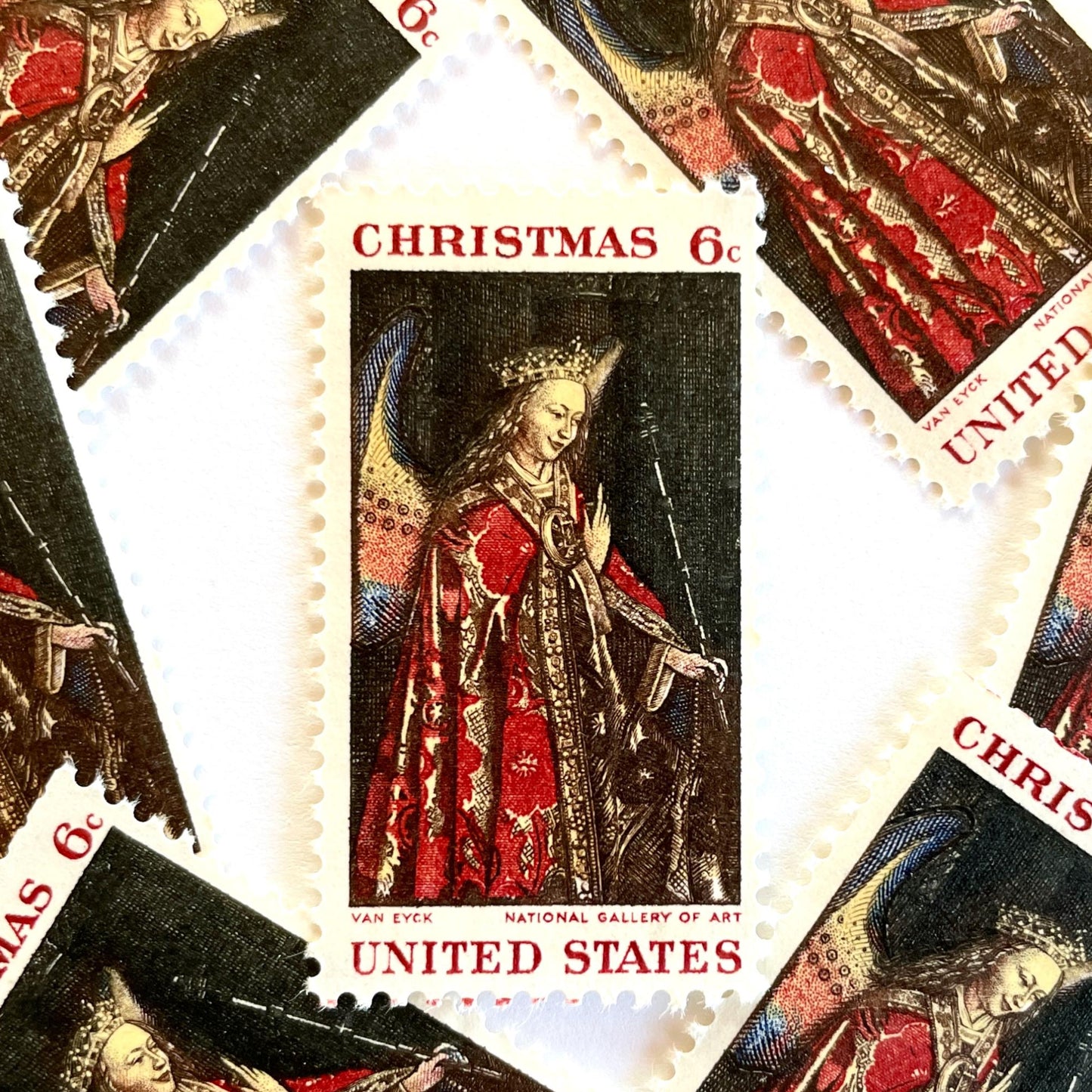 Image of 1968 Christmas Issue “Angel Gabriel” 6-cent stamps. Scott #1363. Stamp Themes: Christmas, Angel, Painting, The Annunciation, Christian Art, Renaissance Painting. Red postage stamp.