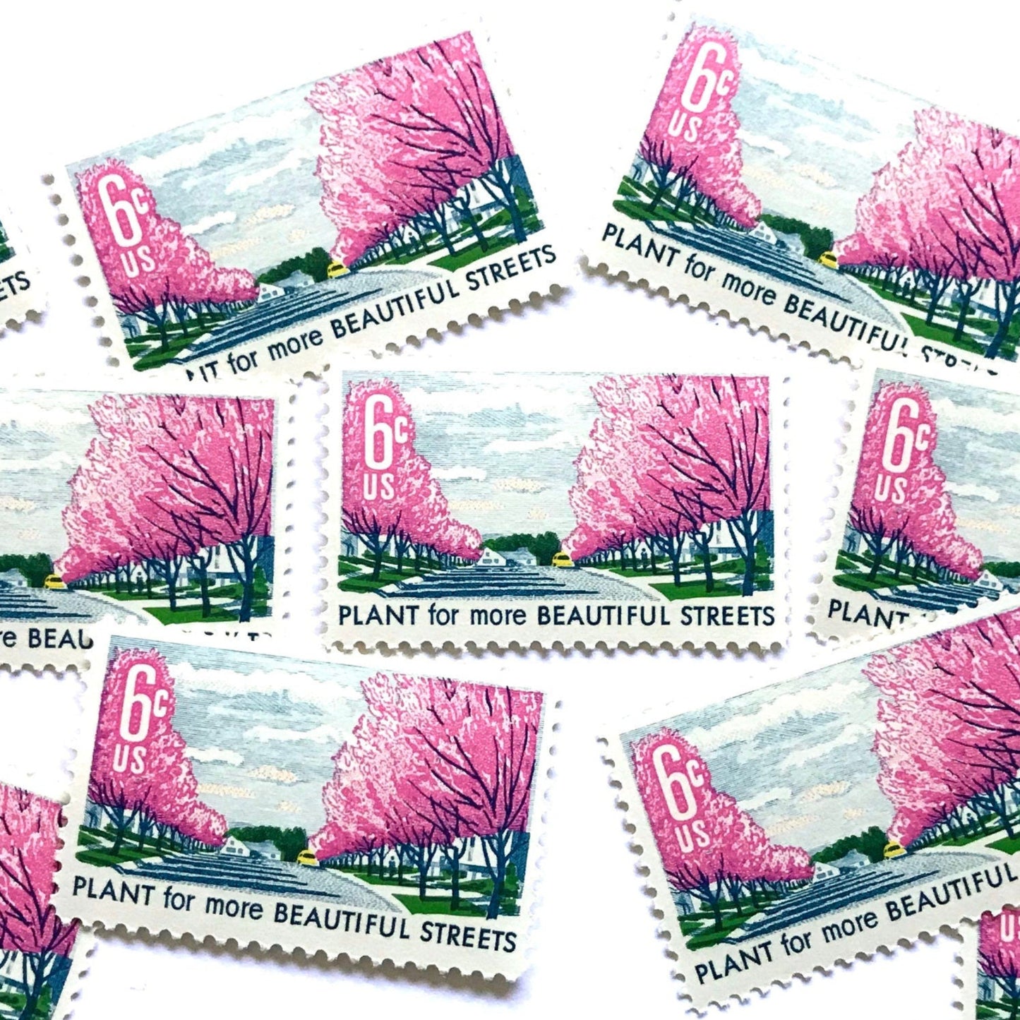 Image of 1966 Beautification of America Plant for More Beautiful Streets 6 cent stamps. Scott #1368. Stamp themes: Trees, Cherry Blossoms, Planting, Arbor Day, Streets, Neighborhood, Suburbs. Pink postage stamp.