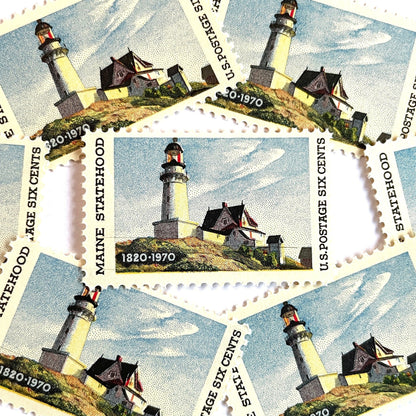 Image of Maine Statehood postage stamps from 1970, featuring Edward Hopper’s Lighthouse at Two Lights, Maine painting on vintage unused 6-cent USPS postage, Scott 1391.