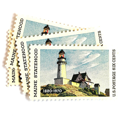 Image of Maine Statehood postage stamps from 1970, featuring Edward Hopper’s Lighthouse at Two Lights, Maine painting on vintage unused 6-cent USPS postage, Scott 1391.