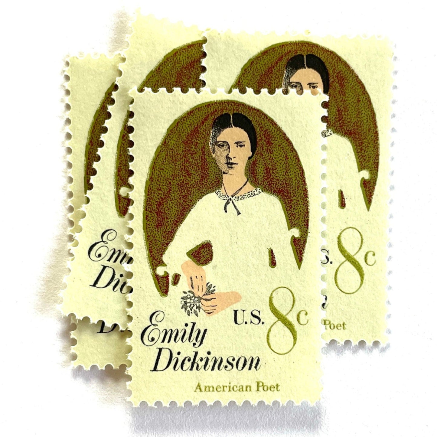 Image of 1971 Emily Dickinson 8 cent stamps. Scott #1436. Stamp themes: Poet, Writer, Women, Famous Woman, Poetry, Literacy, Portrait. Neutral white postage stamp.