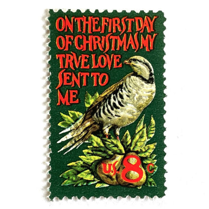 Image of 1971 Contemporary Christmas “Partridge in a Pear Tree” 8 cent stamps. Scott #1445. Stamp Themes: Christmas songs, Christmas carols, Holidays, Birds, Fruit, Partridge in a Pear Tree, The 12 Days of Christmas, on the first day of Christmas my true love sent to me. Red and green postage stamp.