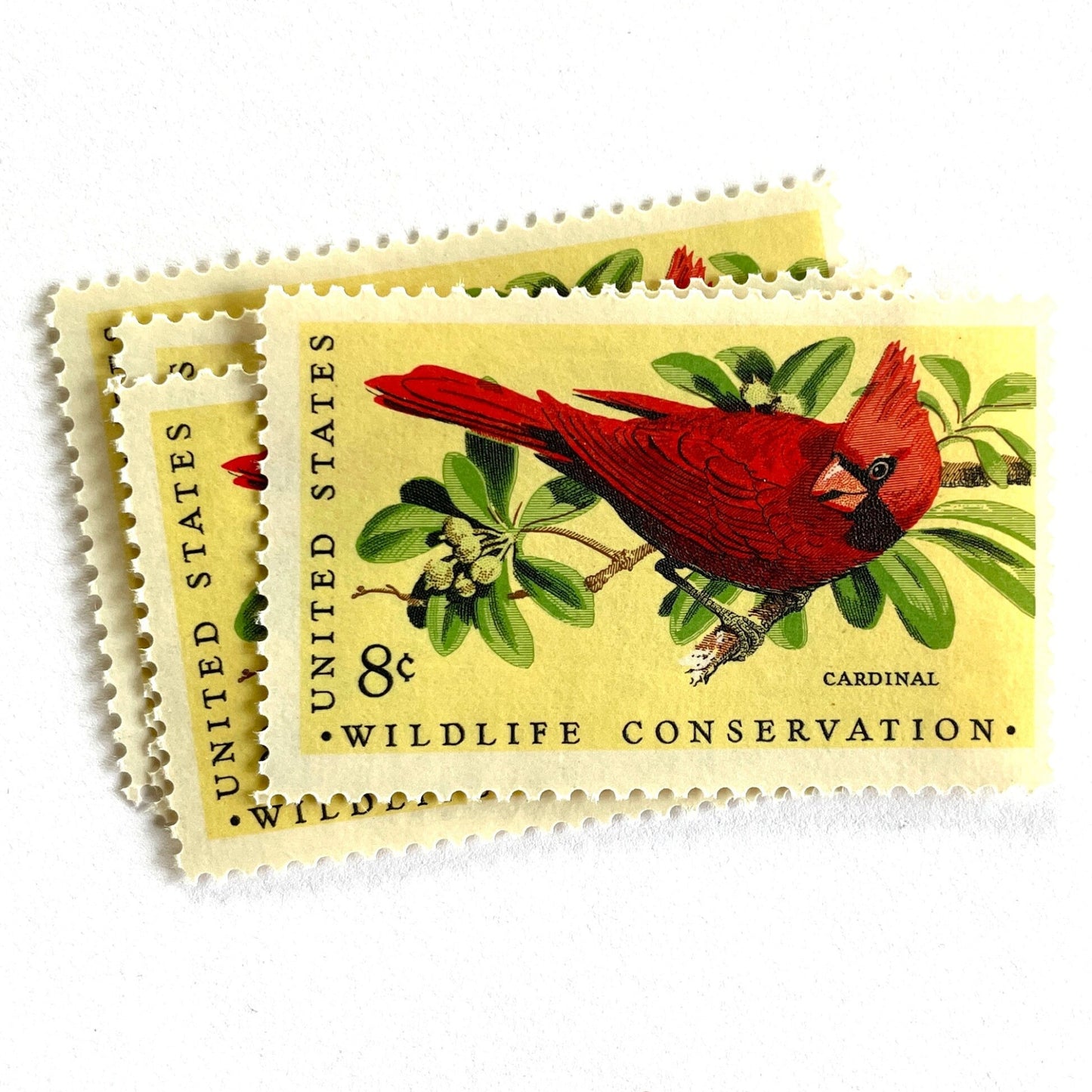 Image of 1972 Wildlife Conservation “Cardinal” 8-cent stamps. Scott #1465. Stamp Themes: Bird, Bird Watching, Bird Perched, Wildlife Conservation, Christmas, Holidays. Red postage stamps.