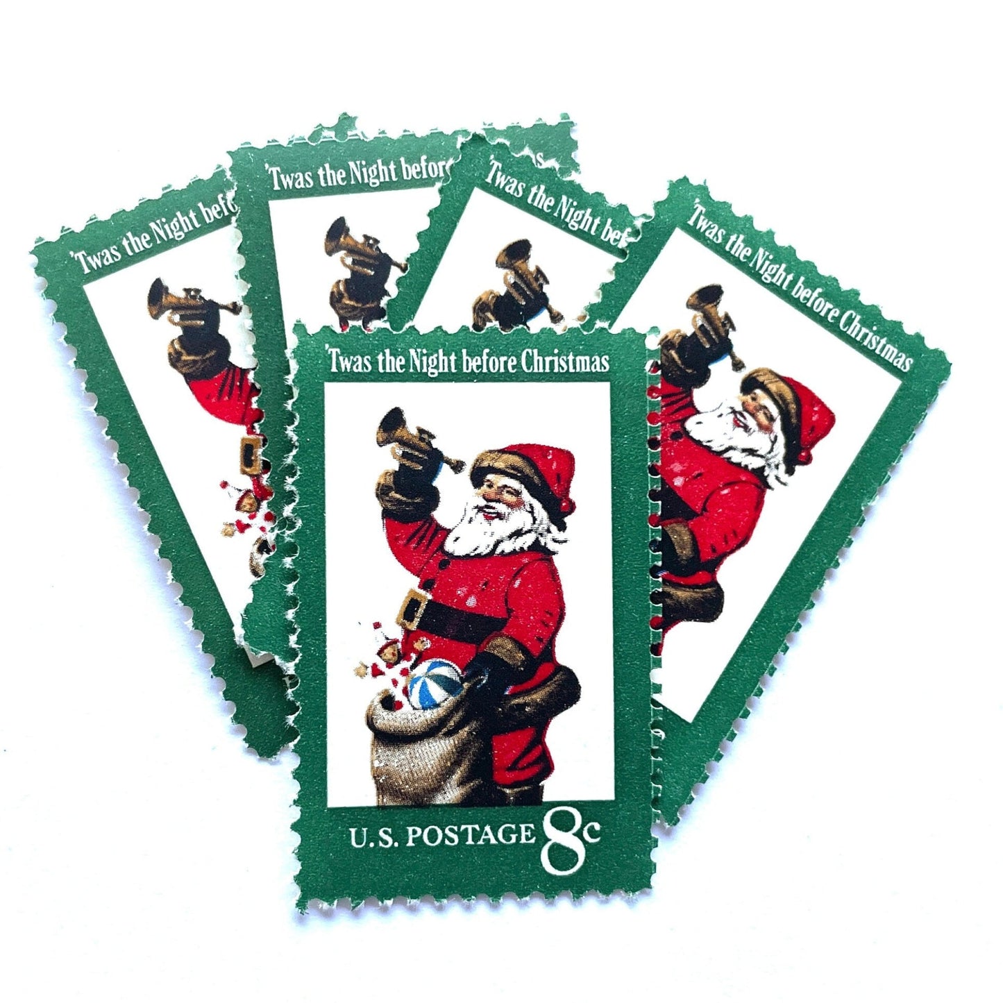 Image of 1972 Contemporary Christmas “Santa Claus” 8-cent stamps. Scott #1472. Stamp Themes: 'Twas the Night Before Christmas, Sack of Toys, Horn, Saint Nicholas, St. Nick, Patron Saint of Children, Holidays. Green postage stamp.