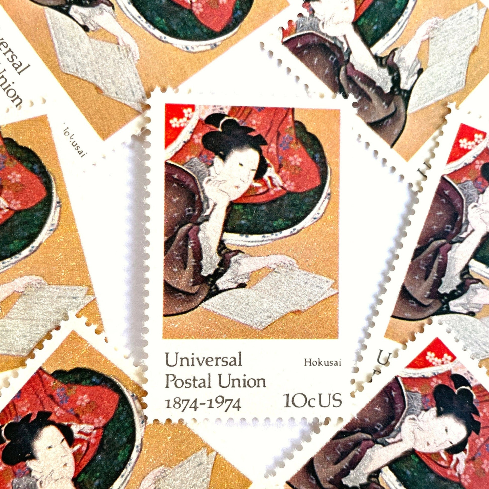 Image of 1974 Famous Works of Art Hokusai 10 cent stamps. Scott #1531. Japanese Art, Woodblock Art, Zen, 100th Anniversary Universal Postal Union, Five Feminine Virtues, artist Katsushika Hokusai, Reading, Kabuki, Kimono. Asian inspired postage stamp.