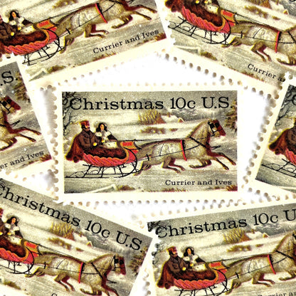 Image of 1974 Currier and Ives "Winter Road" 10 cent stamps. Scott #1551. Stamp themes: Christmas, Sleigh, Holidays, Sleigh-ride, Horse-drawn, Snow. White postage stamp.