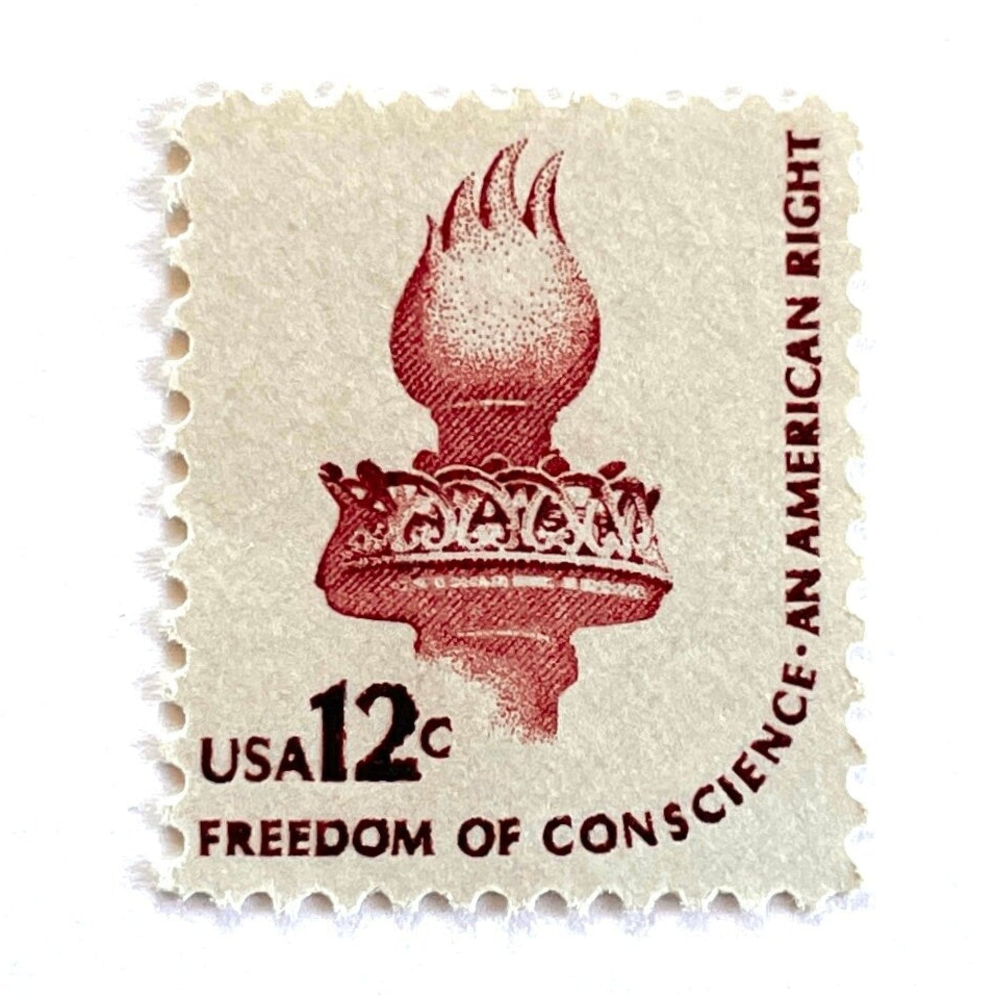 Image of 1981 Americana Series “Statue of Liberty Torch” 12-cent mail stamps. Scott #1594. Stamp Themes: Statue of Liberty, Lady Liberty, Torch, Light, NYC, New York City, Freedom of Conscience, An American Right Immigration. Red/brown postage stamp.