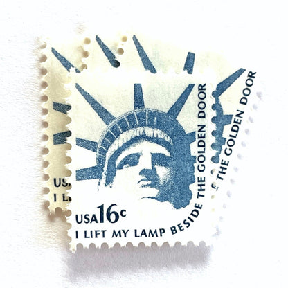 Image of 1978 Americana Series “Statue of Liberty” 16-cent mail stamps. Scott #1599. Stamp Themes: Statue of Liberty, Lady Liberty, NYC, New York City, Immigration. Blue postage stamp.