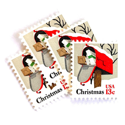 Image of 1977 Contemporary Christmas “Rural Mailbox” 32-cent stamps. Scott #1730. Stamp Themes: Mailbox, Christmas Mail, Christmas Parcels, Christmas Cards, Snow, Rural America. Red and white postage stamp.