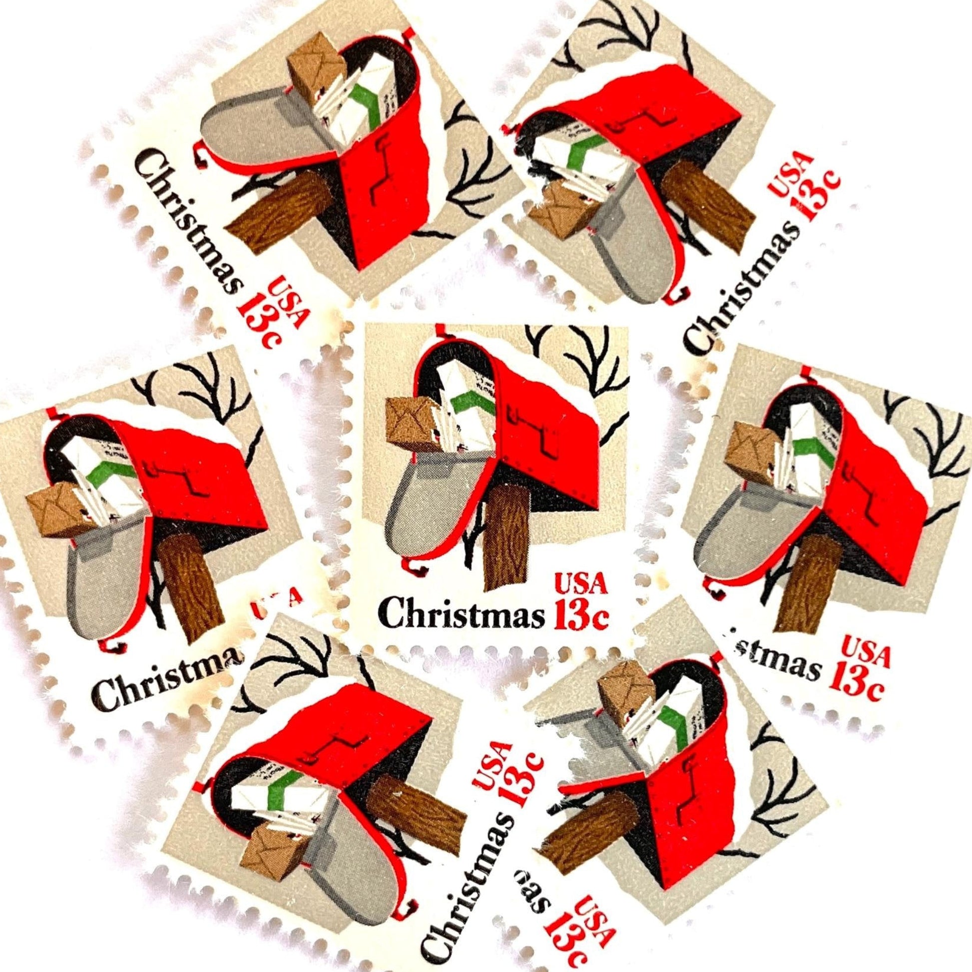 Image of 1977 Contemporary Christmas “Rural Mailbox” 32-cent stamps. Scott #1730. Stamp Themes: Mailbox, Christmas Mail, Christmas Parcels, Christmas Cards, Snow, Rural America. Red and white postage stamp.