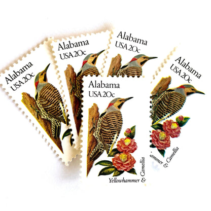 Image of Alabama State Bird and Flower postage stamps from 1982, featuring a Yellowhammer and Camellia on vintage unused 20-cent USPS postage, Scott 1953.