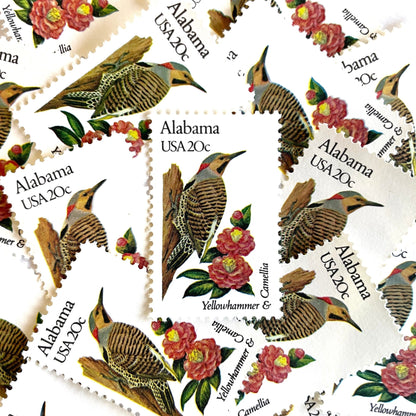 Image of Alabama State Bird and Flower postage stamps from 1982, featuring a Yellowhammer and Camellia on vintage unused 20-cent USPS postage, Scott 1953.