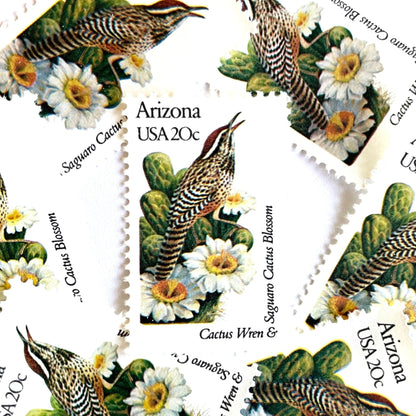 Image of Arizona State Bird and Flower postage stamps from 1982, featuring a Cactus Wren and Saguaro cactus blossom on vintage unused 20-cent USPS postage, Scott 1955.