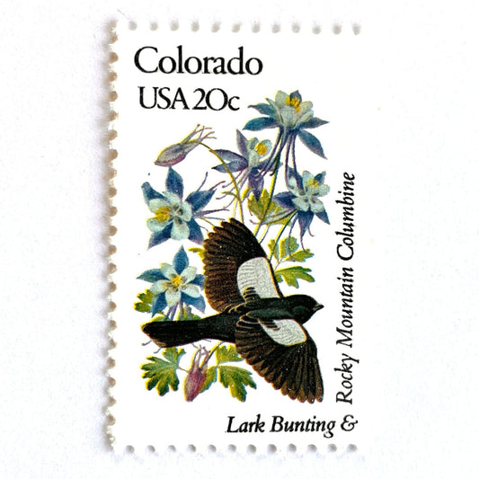 Image of Colorado State Bird and Flower postage stamp from 1982, featuring a Lark Bunting and Columbine on vintage unused 20-cent USPS postage, Scott 1958.