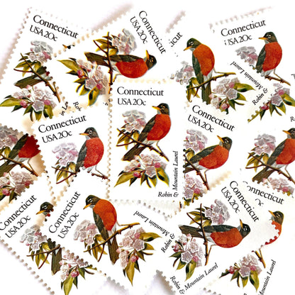 Image of 20-cent State Birds & Flowers 1982 Connecticut USPS postage stamp featuring a Robin and Mountain Laurel. Scott #1959. Stamp themes: Birds, Aviary, Flowers, Flora, Robin, Mountain Laurel, White Flower, Pink Flower, Connecticut State Bird, Connecticut State Flower. Red/Orange postage stamp.