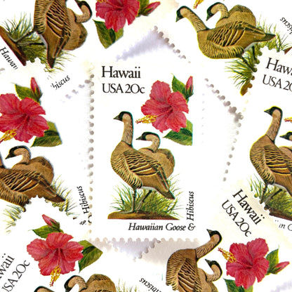 Image of 1982 State Birds & Flowers Hawaii 20 cent stamps. Scott #1963. Stamp themes: Nene, Hawaiian Goose, Hibiscus, Yellow Hibiscus, Hawaii State Bird, Hawaii State Flower, Aloha. White and red postage stamp.