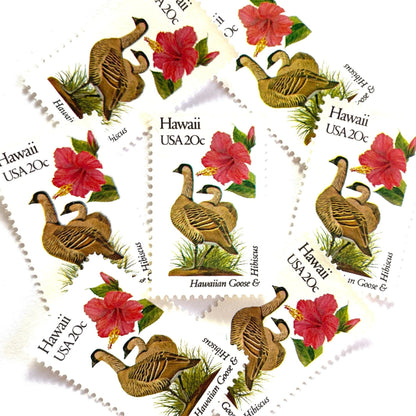 Image of 1982 State Birds & Flowers Hawaii 20 cent stamps. Scott #1963. Stamp themes: Nene, Hawaiian Goose, Hibiscus, Yellow Hibiscus, Hawaii State Bird, Hawaii State Flower, Aloha. White and red postage stamp.