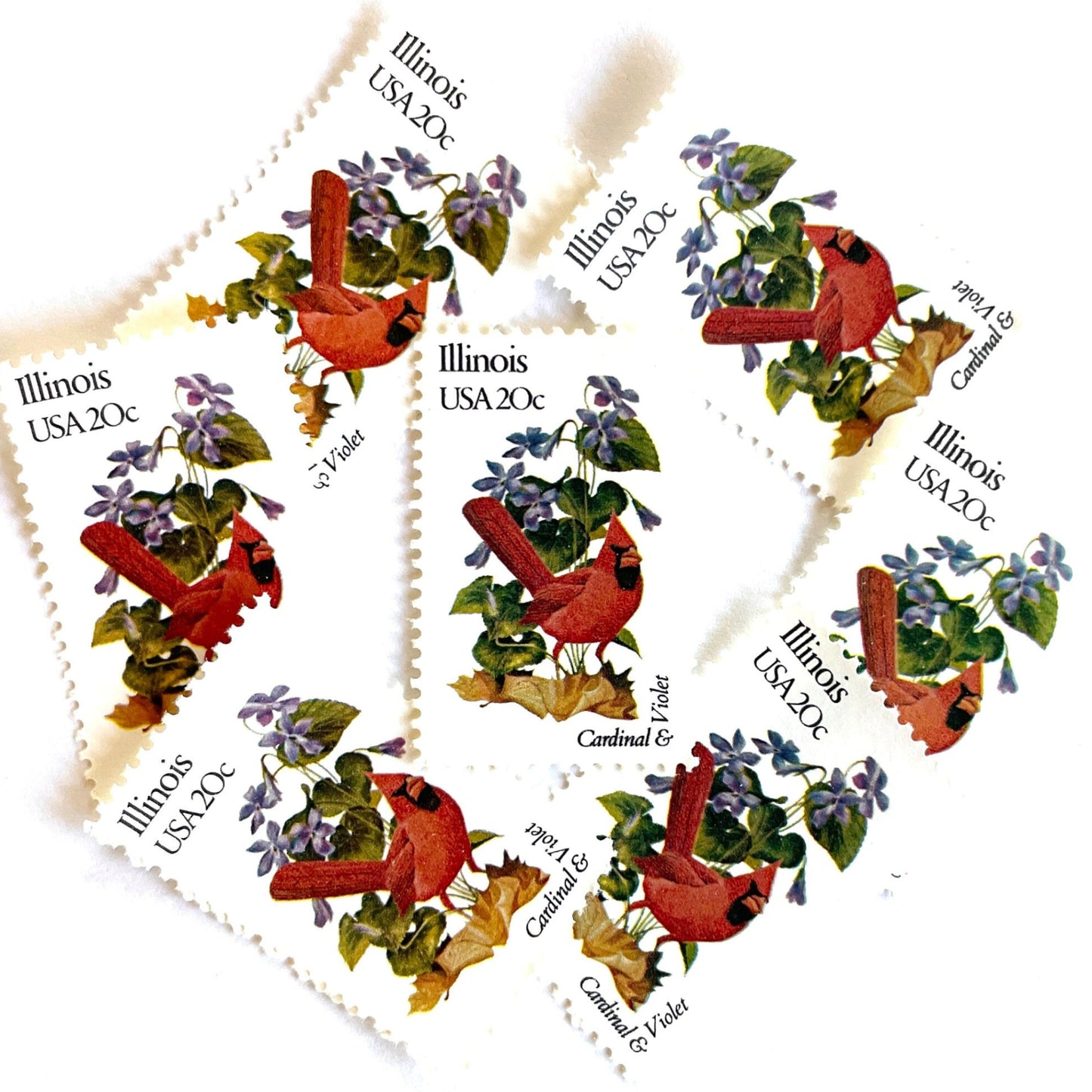 Image of Illinois State Bird and Flower postage stamps from 1982, featuring a Cardinal and Violet on vintage unused 20-cent USPS postage, Scott 1965.