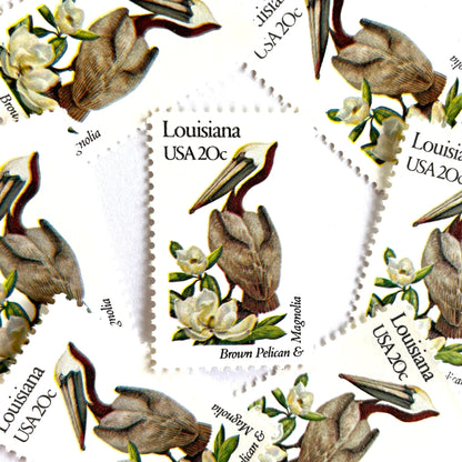 Image of Louisiana State Bird and Flower postage stamps from 1982, featuring a Brown Pelican and Magnolia on vintage unused 20-cent USPS postage, Scott 1970.